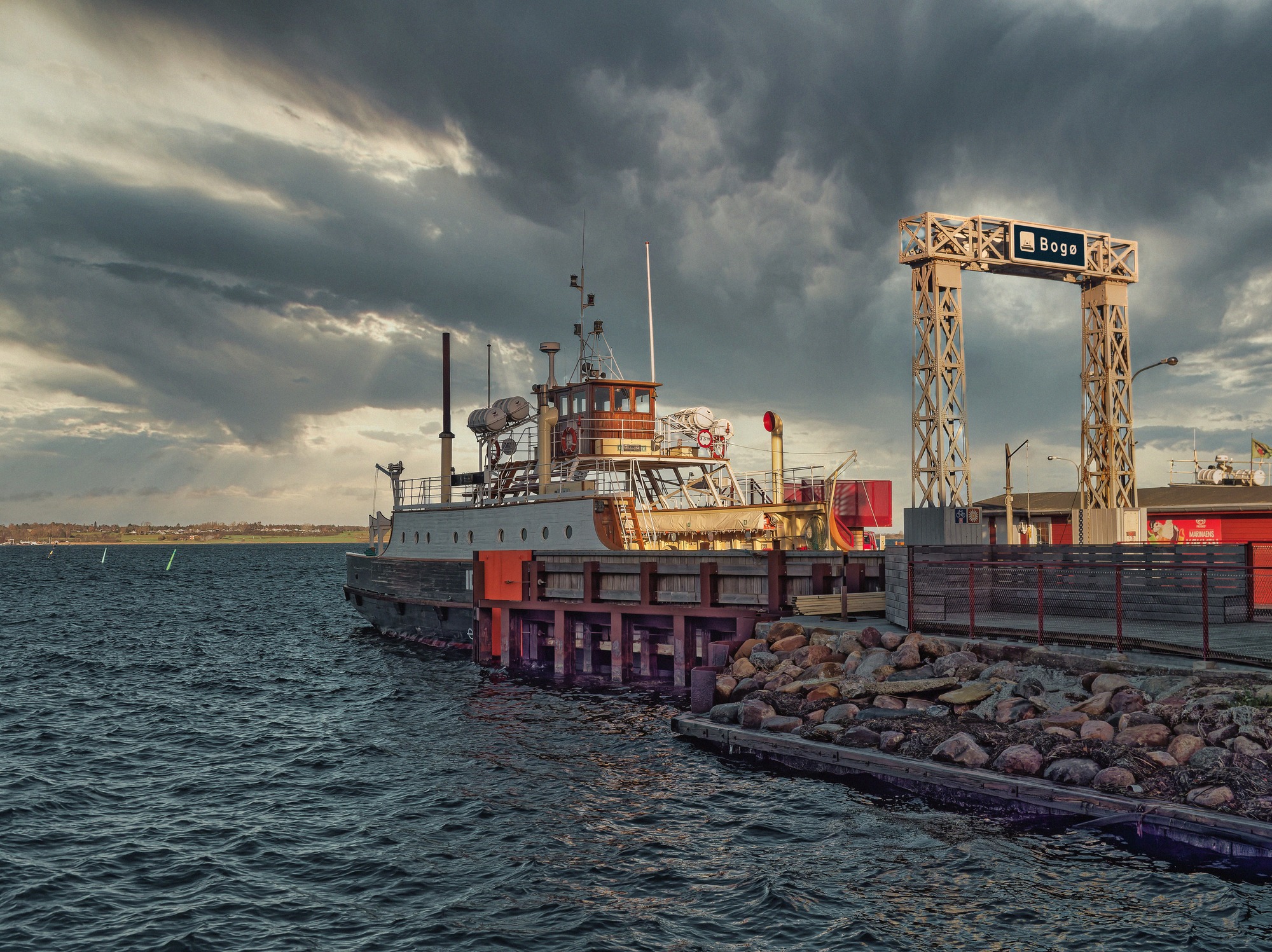 The small ferry to Stubbekøbing at the Bogø landing. The historic car ferry at the Bogø ferry landing